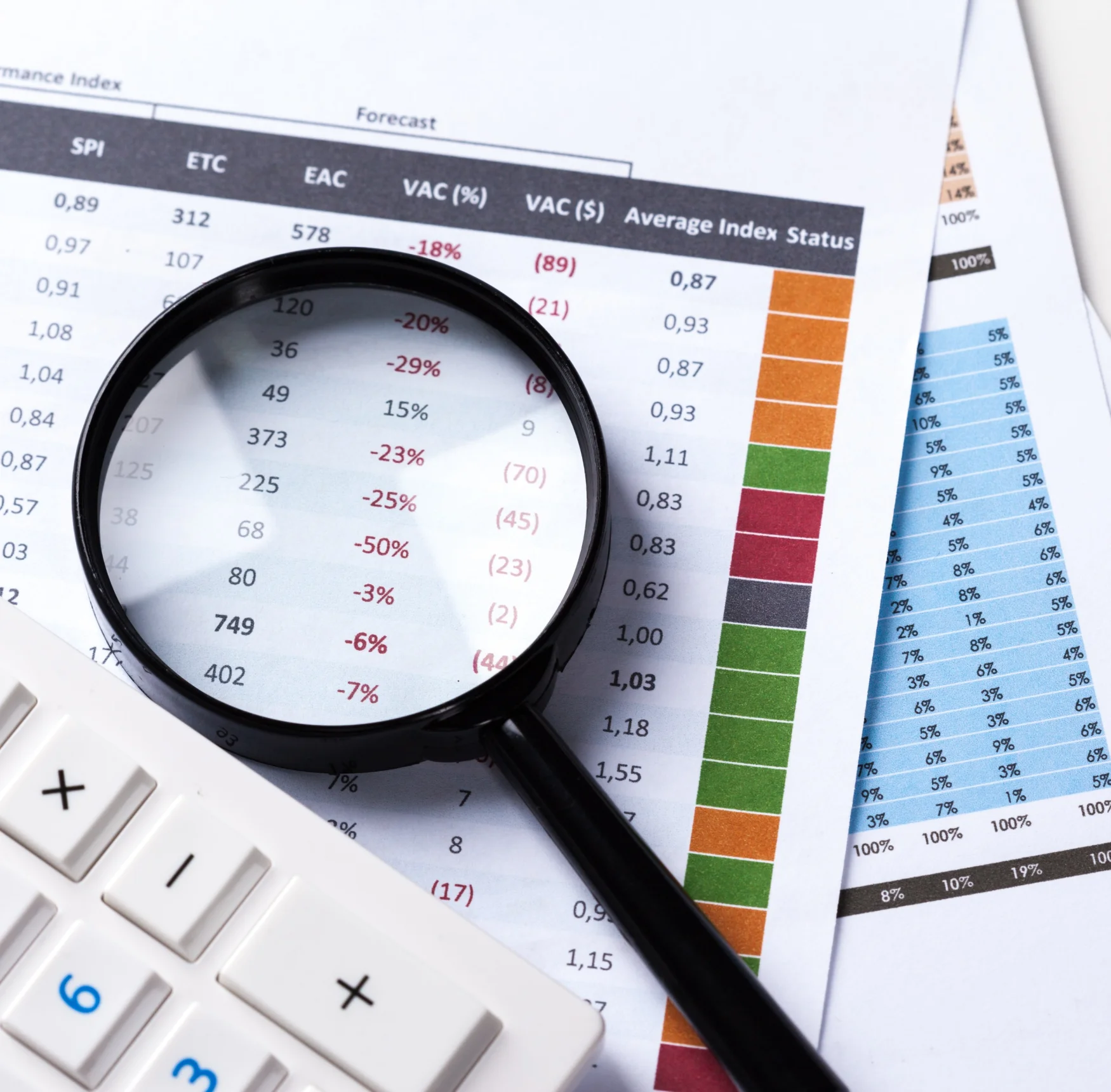 work-with-magnifying-glass-calculator-papers.jpg