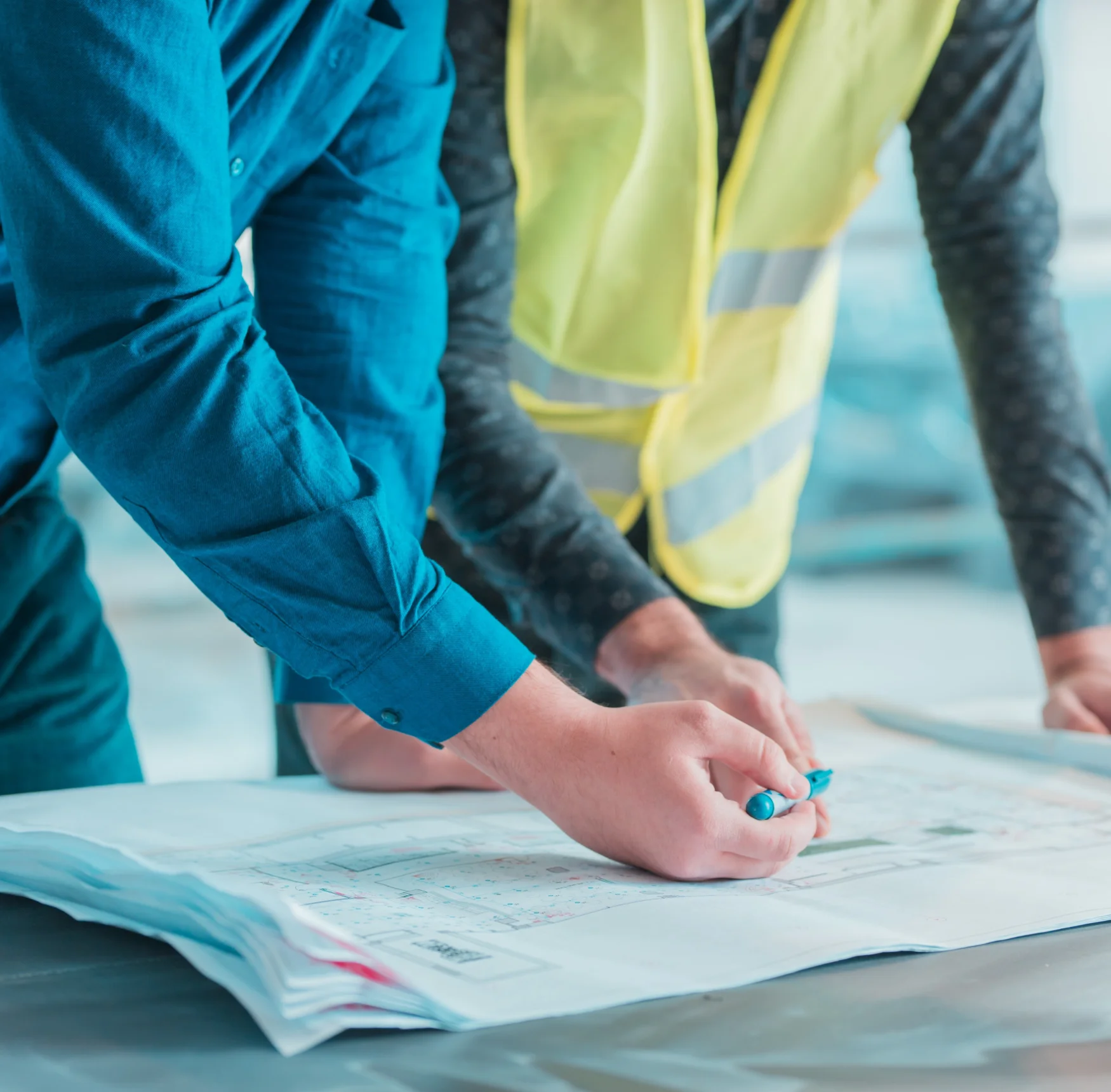 workers-checking-out-architectural-plan-project.jpg